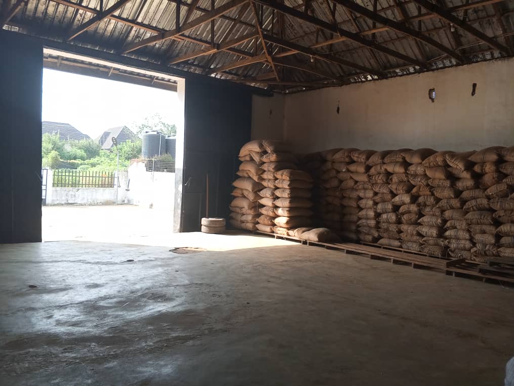 Warehouse entrance with bagged commodity staged for loading