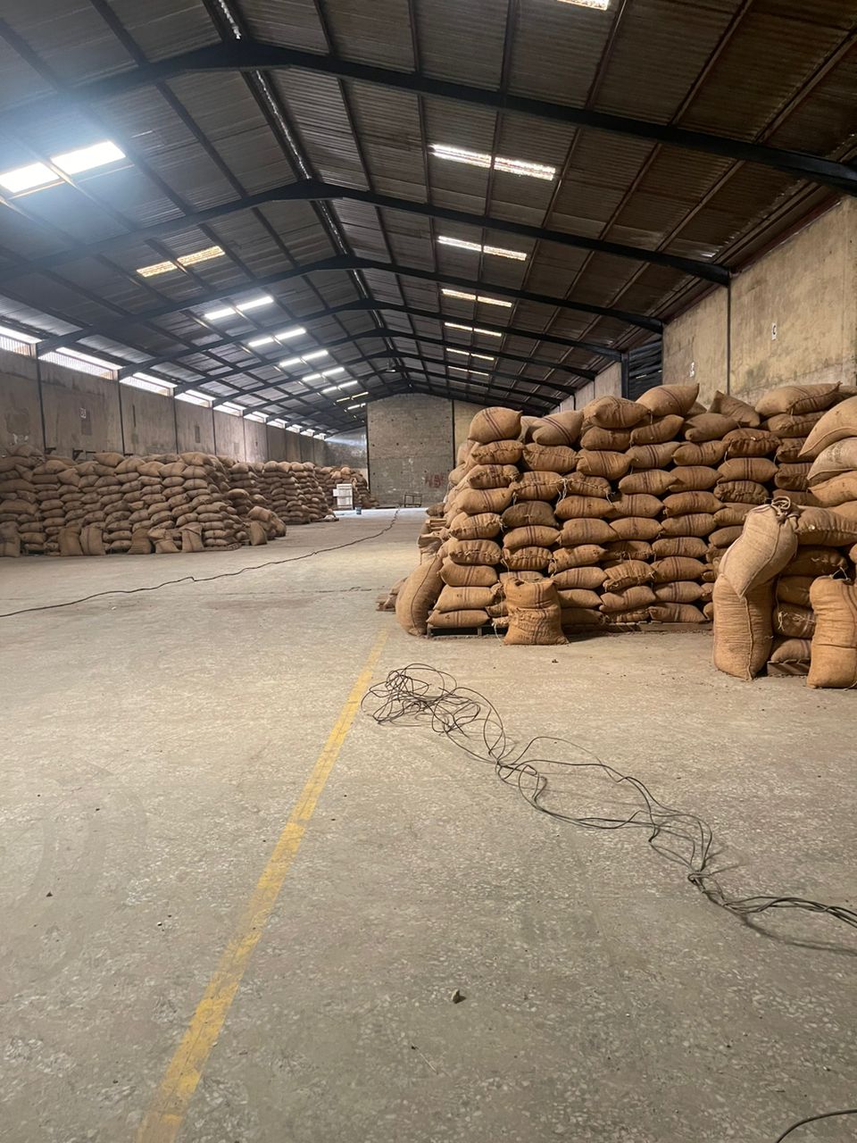 BMV Tunde cocoa warehouse, bagged and stacked for export